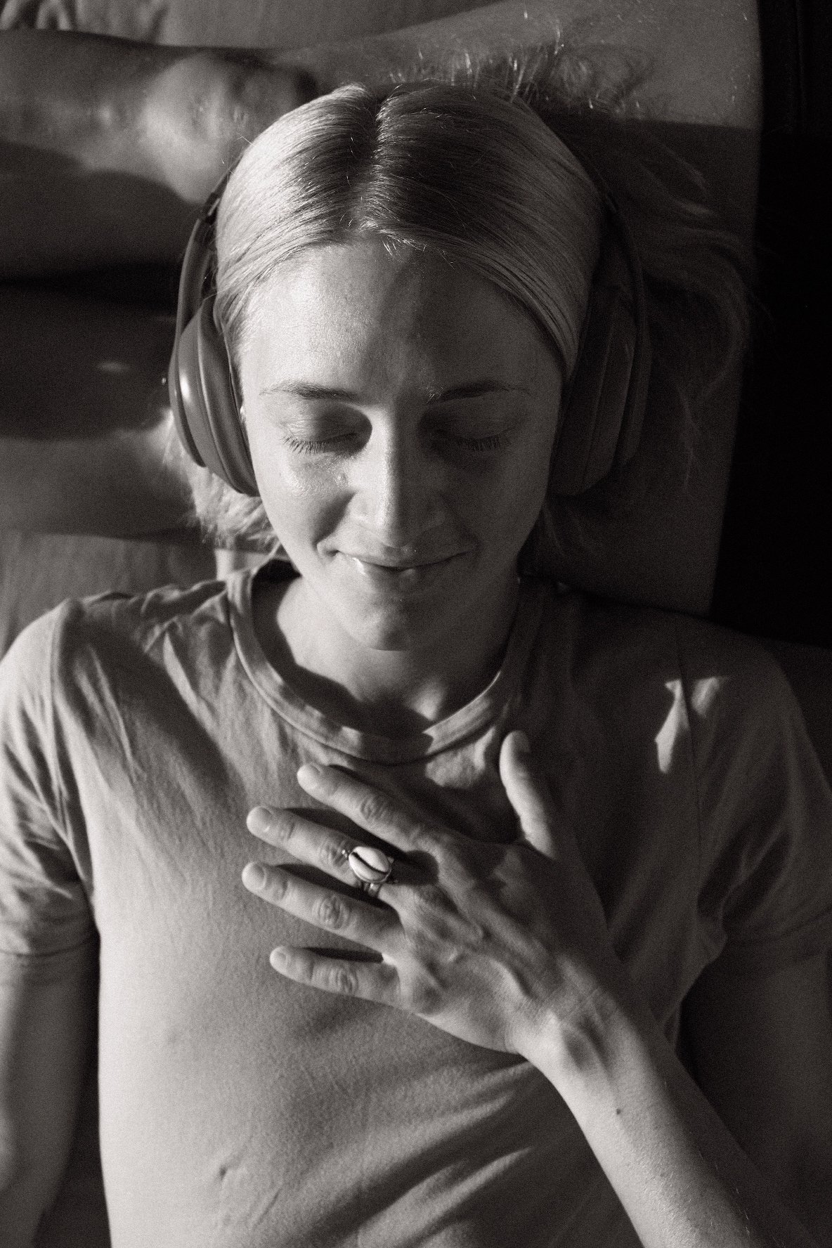 A woman settled in a quiet, grounded moment